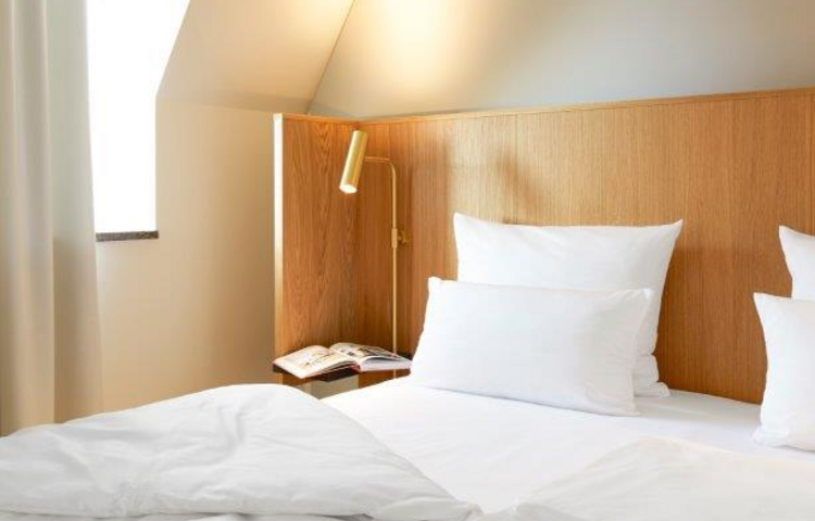 Melter Hotel & Apartments - Bett Doppelzimmer